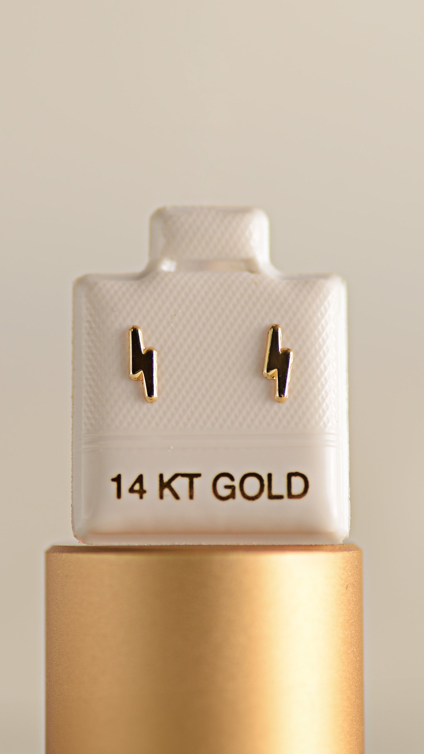 Broquel de Rayito plano en oro amarillo de 14K